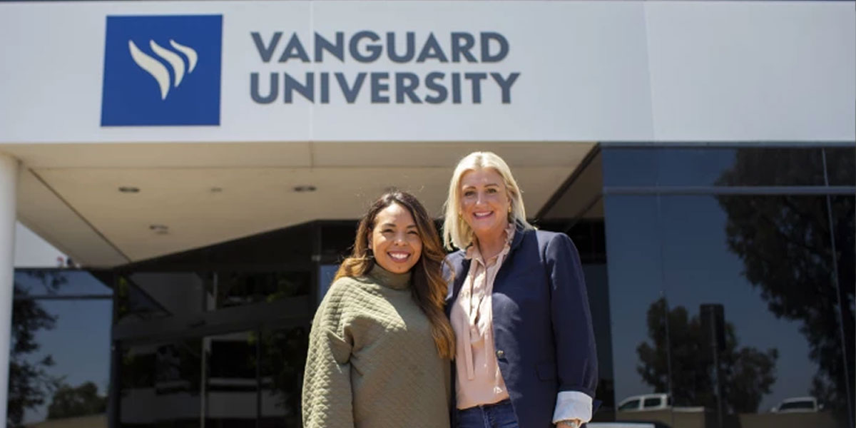 Dr. Brenda Gesell, left, the Vanguard University director of the graduate program in clinical psychology, and Dalila Perea, a VU graduate and young counselor from Santa Ana stand together on campus.(Scott Smeltzer / Staff Photographer)